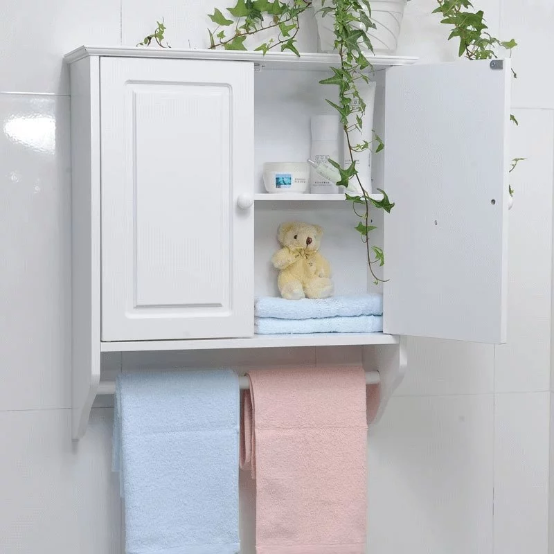 White bathroom cabinet with towel bar